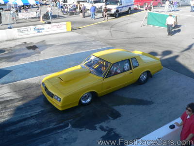 Yellow Monte Carlo Drag Car